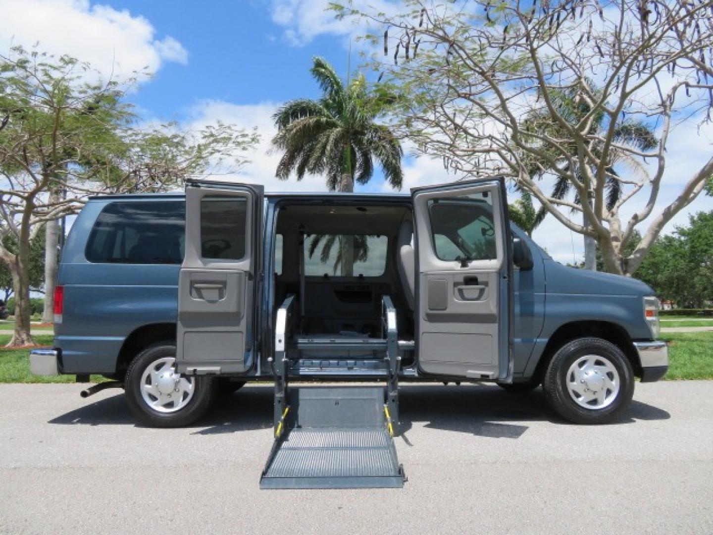 2013 Dark Blue /Gray Ford E-Series Wagon XLT (1FMNE1BW4DD) with an 4.6L V8 engine, Automatic transmission, located at 4301 Oak Circle #19, Boca Raton, FL, 33431, (954) 561-2499, 26.388861, -80.084038 - You are looking at a Gorgeous 2013 Ford E150 XLT Handicap Wheelchair Conversion Van with 22K Original Miles, Tie Down System, Power Electric VMI Side Entry Wheelchair Lift, Back Up Camera, Factory Navigation and Much Much More. This van is Awesome. This is a Nice Rust Free Van with a Clean Carfax, C - Photo#38